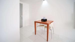 Homey Studio Apartment at Dian Regency By Travelio