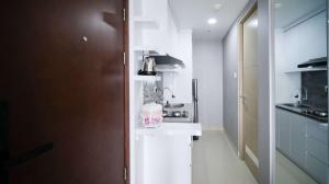 Nice and Comfy Studio Grand Dharmahusada Lagoon Apartment By Travelio