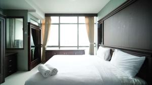 Homey 1BR Apartment at Aryaduta Residence Surabaya By Travelio