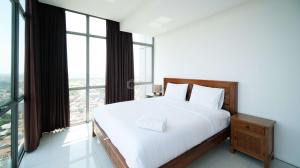 Homey 1BR with Extra Room Apartment at Aryaduta Residence Surabaya By Travelio
