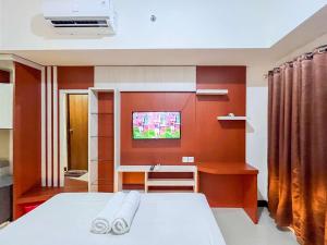 Minimalist Studio Vida View Makassar Apartment By Travelio