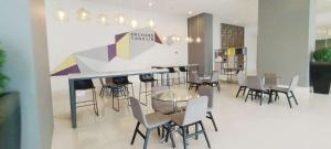 Homey Studio at Orchard Supermall Mansion Apartment By Travelio