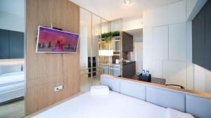 Homey Studio at Orchard Supermall Mansion Apartment By Travelio