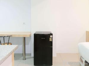 Cozy Studio Room at De Prima Apartment By Travelio