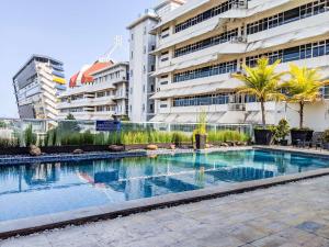 Cozy Studio The Square Surabaya Apartment By Travelio