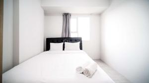 Homey 2BR Apartment at Suncity Residence By Travelio