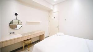 Best Price and Comfortable Living 2BR at Anderson Supermall Mansion Apartment By Travelio