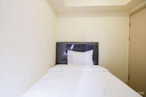 New Furnished and Comfy 2BR at Meikarta Apartment By Travelio