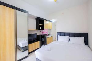 Comfortable Springlake Summarecon Studio Apartment near Mall By Travelio
