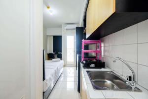 Comfortable Springlake Summarecon Studio Apartment near Mall By Travelio