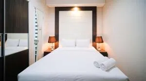 Best Location and Tidy 2BR Apartment at Trillium Residence By Travelio - Plosobegem