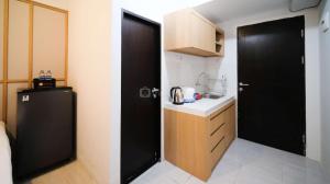 Good Location and Best Deals Studio Apartment at Suncity Residence By Travelio