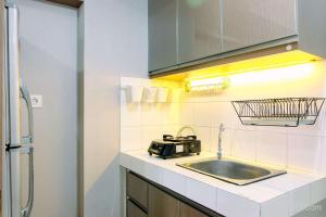 Enjoyable 2BR at Springlake Summarecon Bekasi Apartment By Travelio