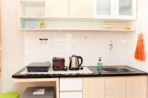 Homey and Tidy Studio Monroe Tower Apartment By Travelio