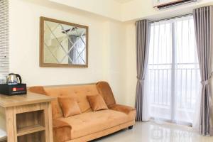 Nice and Comfort 2BR Apartment at Meikarta By Travelio