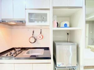 Spacious and Minimalist 2BR Apartment at Parahyangan Residence By Travelio