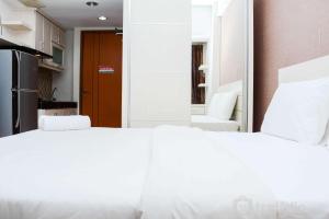 Strategic and Comfy Studio Apartment at Margonda Residence 5 By Travelio