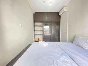 Cozy 2BR Apartment at Parahyangan Residence Bandung near UNPAR By Travelio