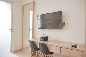 Warm and Best Studio at Menteng Park Apartment By Travelio