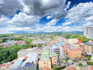 Cozy and Clean 1BR Apartment at Parahyangan Residence By Travelio