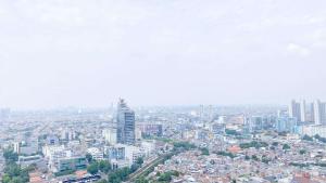 Modern and Elegant 2BR at Menteng Park Apartment By Travelio