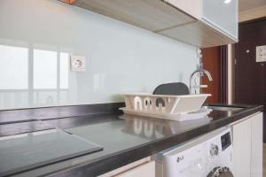 Modern and Elegant 2BR at Menteng Park Apartment By Travelio