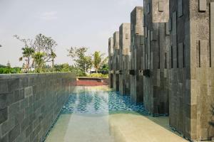 Best Choice and Restful 1BR CitraLake Suites Apartment By Travelio