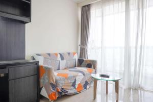 Elegant and Comfy 2BR with Private Lift at Menteng Park Apartment By Travelio