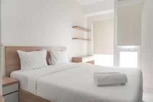 Modern Look and Homey Studio Apartment Amazana Serpong By Travelio