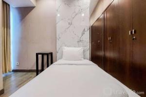 Cozy Stay 2BR Branz BSD City Apartment near AEON Mall By Travelio