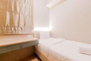 Serene 2BR Sky House BSD Apartment next to AEON Mall By Travelio