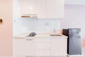 Serene 2BR Sky House BSD Apartment next to AEON Mall By Travelio