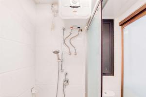 Serene 2BR Sky House BSD Apartment next to AEON Mall By Travelio