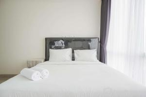 Elegant and Spacious 3BR Menteng Park Apartment By Travelio