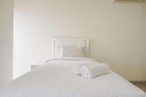 Elegant and Spacious 3BR Menteng Park Apartment By Travelio