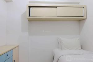 Good Choice 2BR at 12th Floor Gateway Ahmad Yani Cicadas Apartment By Travelio