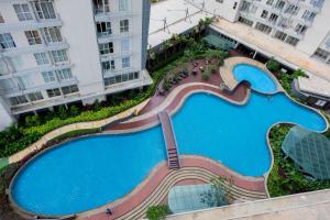 Elegant Studio Apartment at Casa De Parco near ICE BSD By Travelio