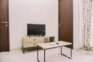Comfort and Homey 2BR at Transpark Bintaro Apartment By Travelio - Mencil
