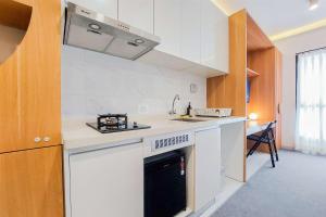 Minimalist Studio at Sky House Alam Sutera Apartment By Travelio