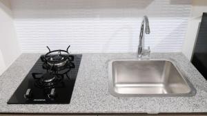 Elegant and Best Choice Studio at Grand Sungkono Lagoon Apartment By Travelio