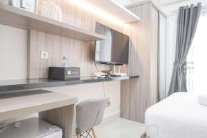 Nice Studio at 11th Floor Transpark Cibubur Apartment By Travelio