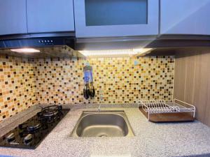 Best Deal 1BR Apartment at Parahyangan Residence Bandung By Travelio