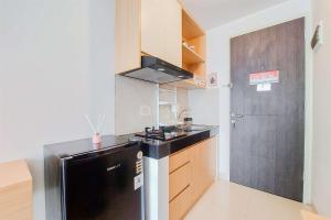 Minimalist and Strategic Studio at Serpong Garden Apartment By Travelio