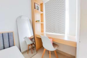 Minimalist and Strategic Studio at Serpong Garden Apartment By Travelio