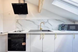 Appartements Studio 1 : photos des chambres