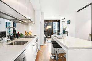 2 Units! Dual Building CBD Living, 1 Min to SkyBus