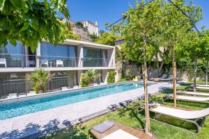 B&B / Chambres d'hotes Le Pavillon M, Piscine et Spa au pied du chateau, Petit-Dejeuner inclus, Parking prive : photos des chambres