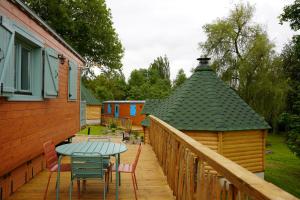 Campings Roulottes et son kota grill sauna : photos des chambres