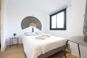 Appartements Un coin de paradis avec vue Mer et jardin : photos des chambres