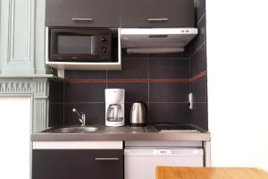 Appartements La Maison bleue, un emplacement de choix a Rodez : photos des chambres